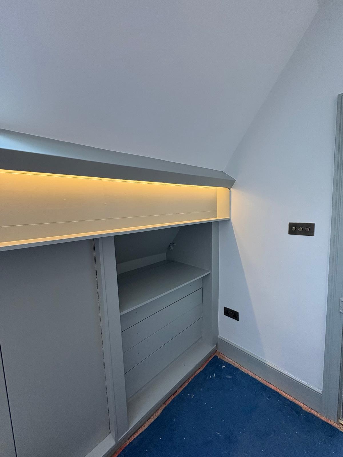 Alcove LED strip lighting with sockets